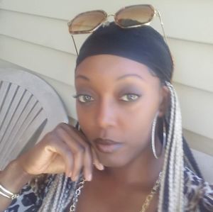 Braided two tone wig.